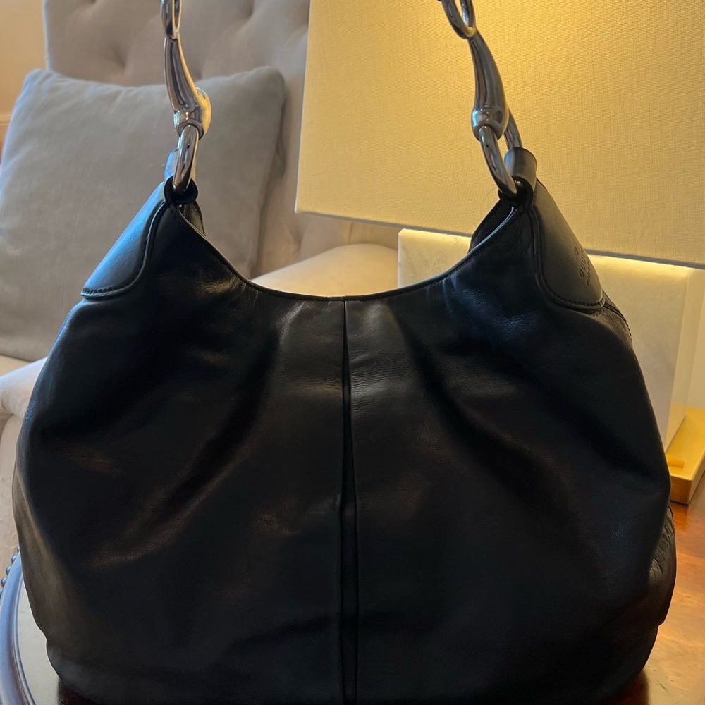 Elegant GUCCI Black Calf Skin Leather Hobo Bag, with chunky silver hardware.
